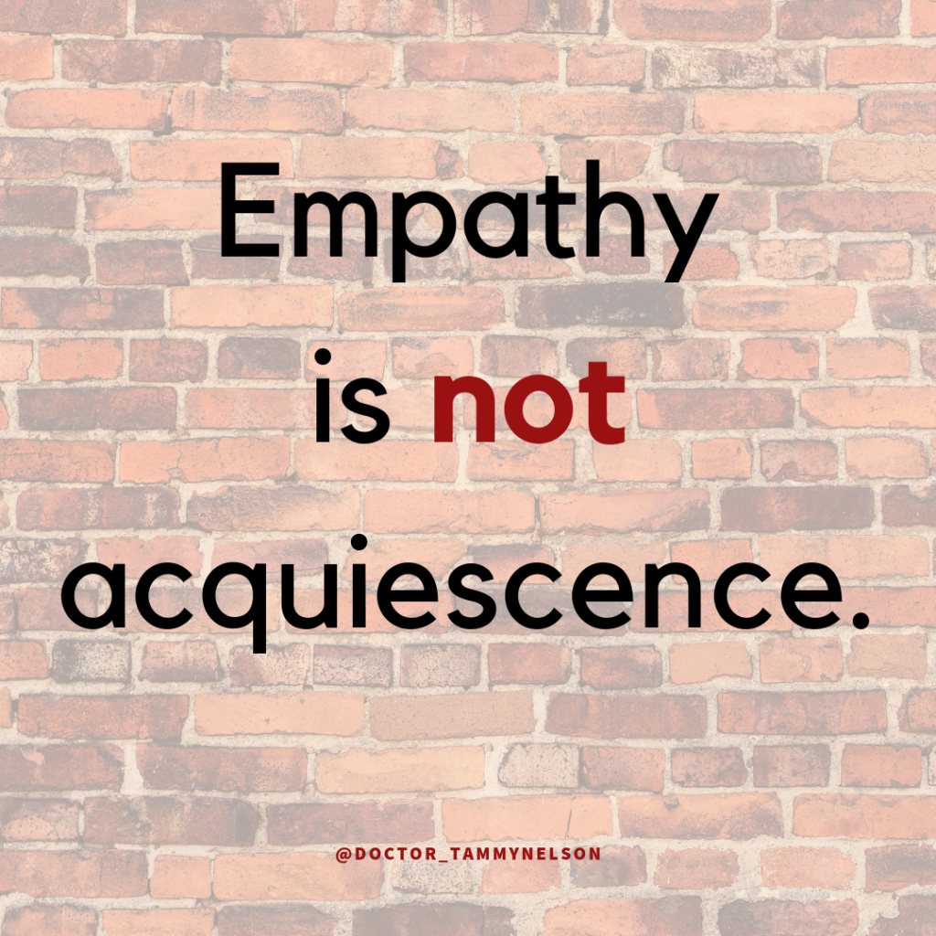 Brick wall with words "Empathy is not acquiescence"